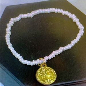 Elegant Gold and White Beaded Bracelet